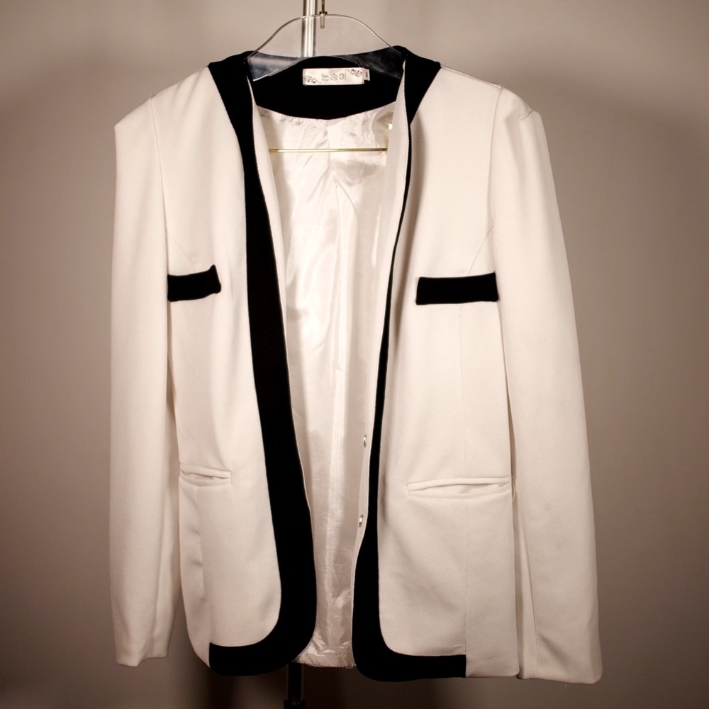 White and black blazer